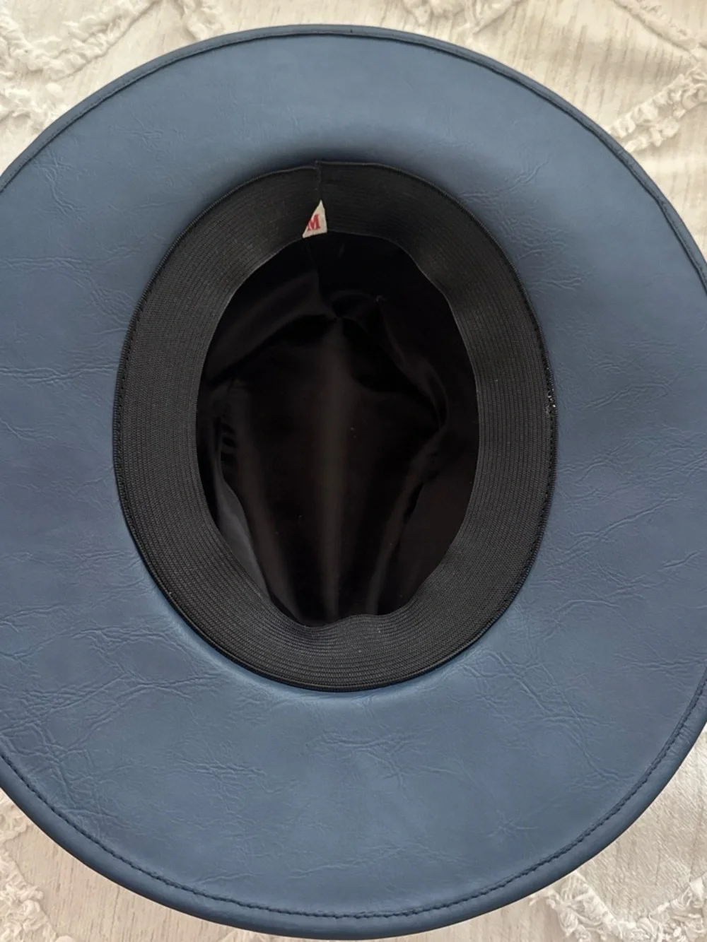 Dark blue braided brim